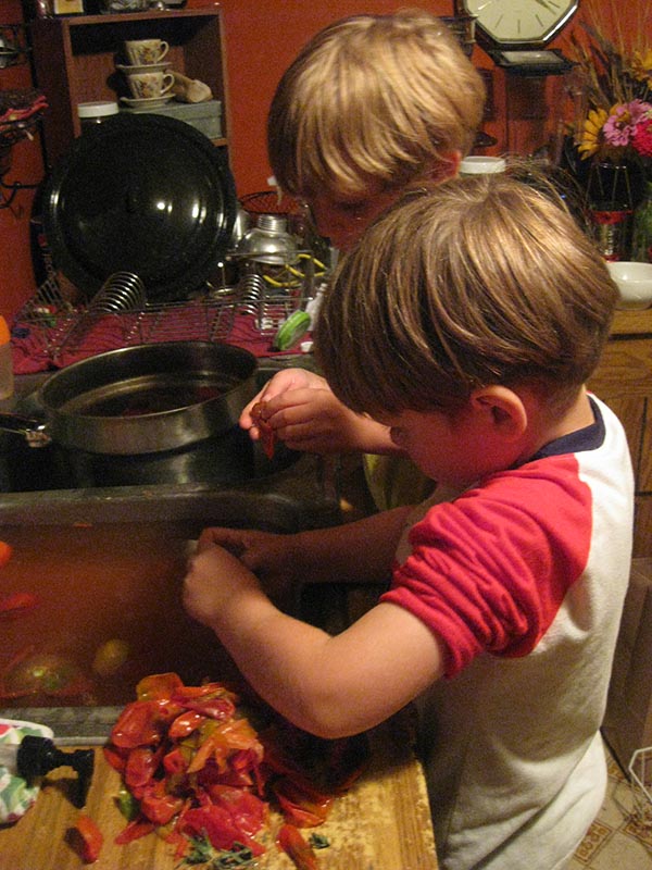 Peeling tomatoes is simple, but when ploughing through a large batch, it certainly helps to have all hands on deck. :)