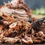 This slow cooker pulled pork is a perennial favorite in our family! It's moist, scrumptious, and easy to prepare. We love it for quick weeknight dinners and parties too!