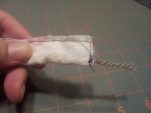 drawstring - yarn or ribbon sewn in