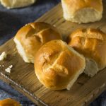 These 1-hour dinner rolls are both fluffy and big on flavor. Whether you need a quick dinner roll for Thanksgiving or you want a perfect accompaniment to pulled pork, this recipe is sure to please.