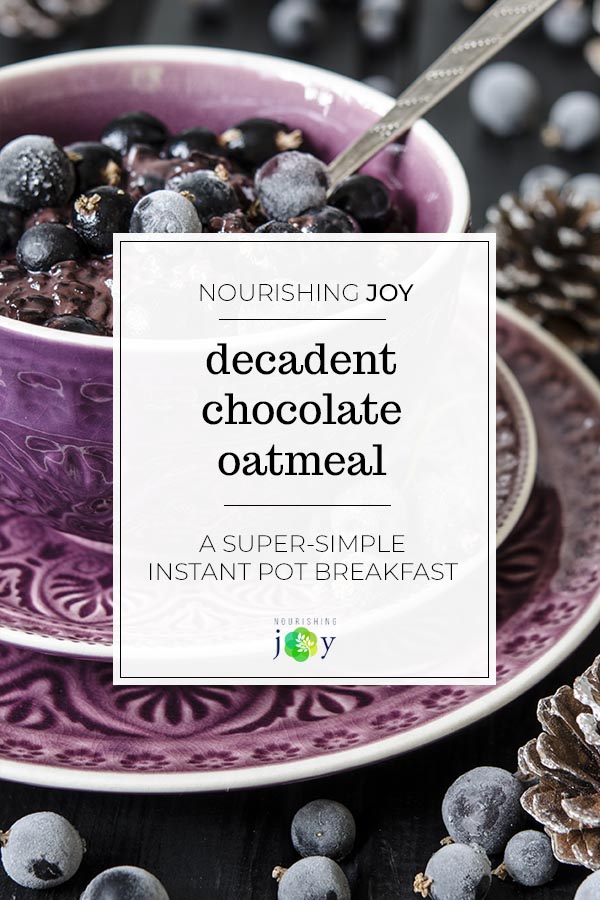 Decadent Instant Pot chocolate oatmeal - made even better with berries and a drizzle of cream. Yum!
